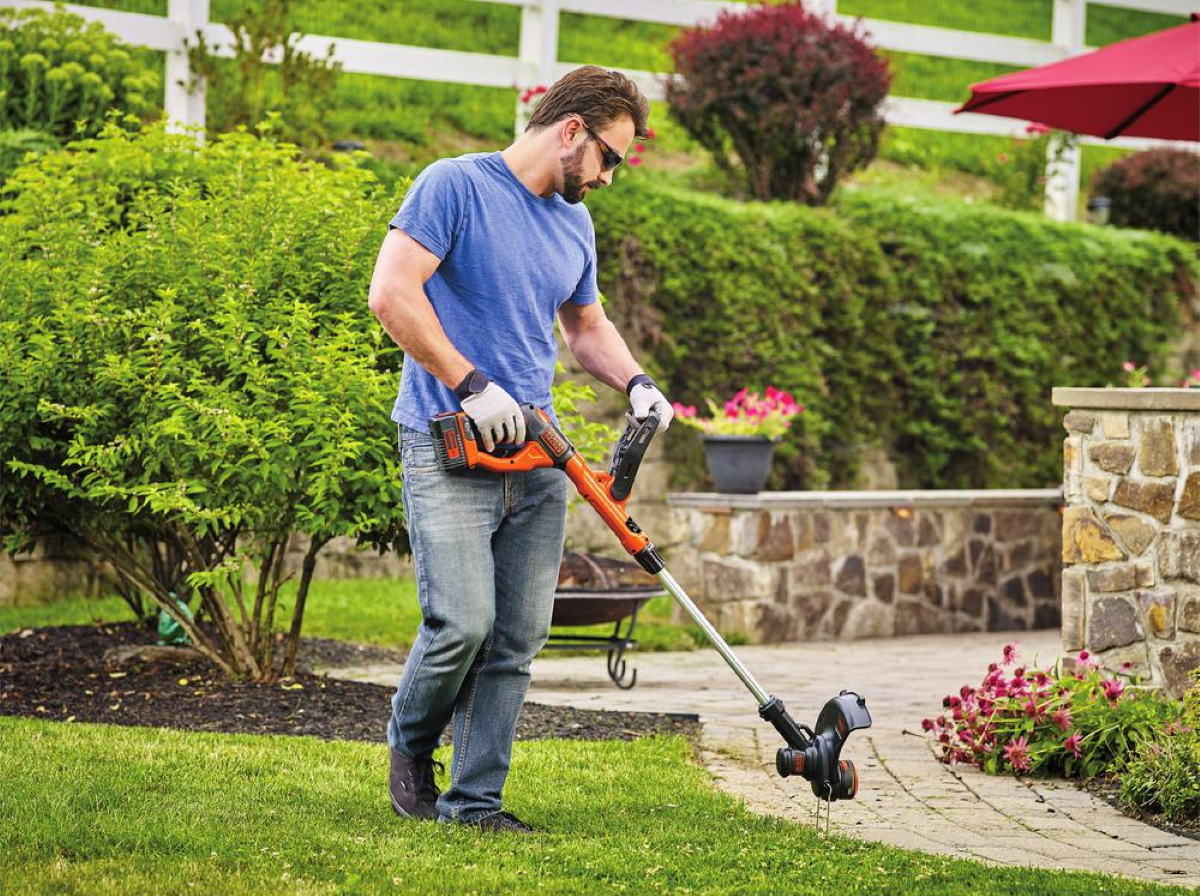 LST140C used as an Edger around sidewalks, trees and flower beds