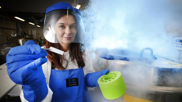 Immunologist Professor Katherine Kedzierska holding a frozen blood sample. ~Picture by: David Caird